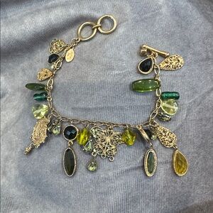 Cookie Lee Gold tome butterflyโ filigree charm bracelet